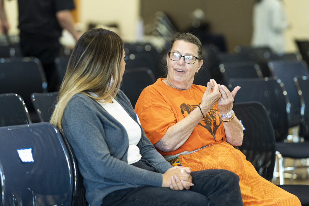 YPP's elder-in-residence speaks with a participant.